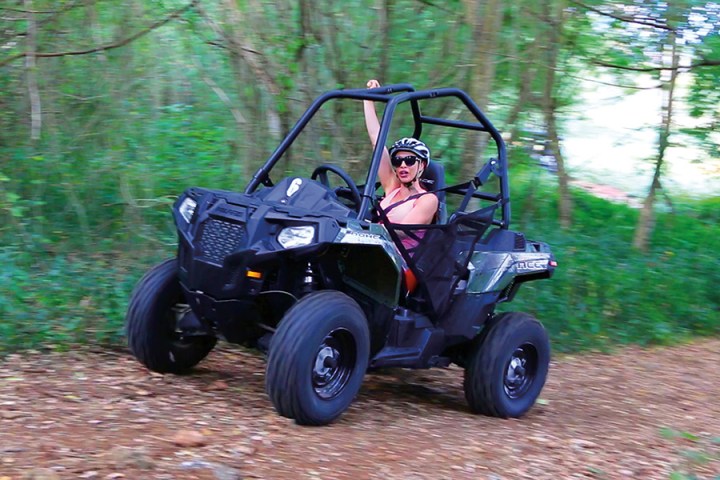 A woman driving her buggy