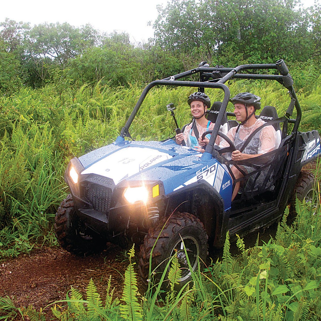 Two people enjoying a ride in the double buggy