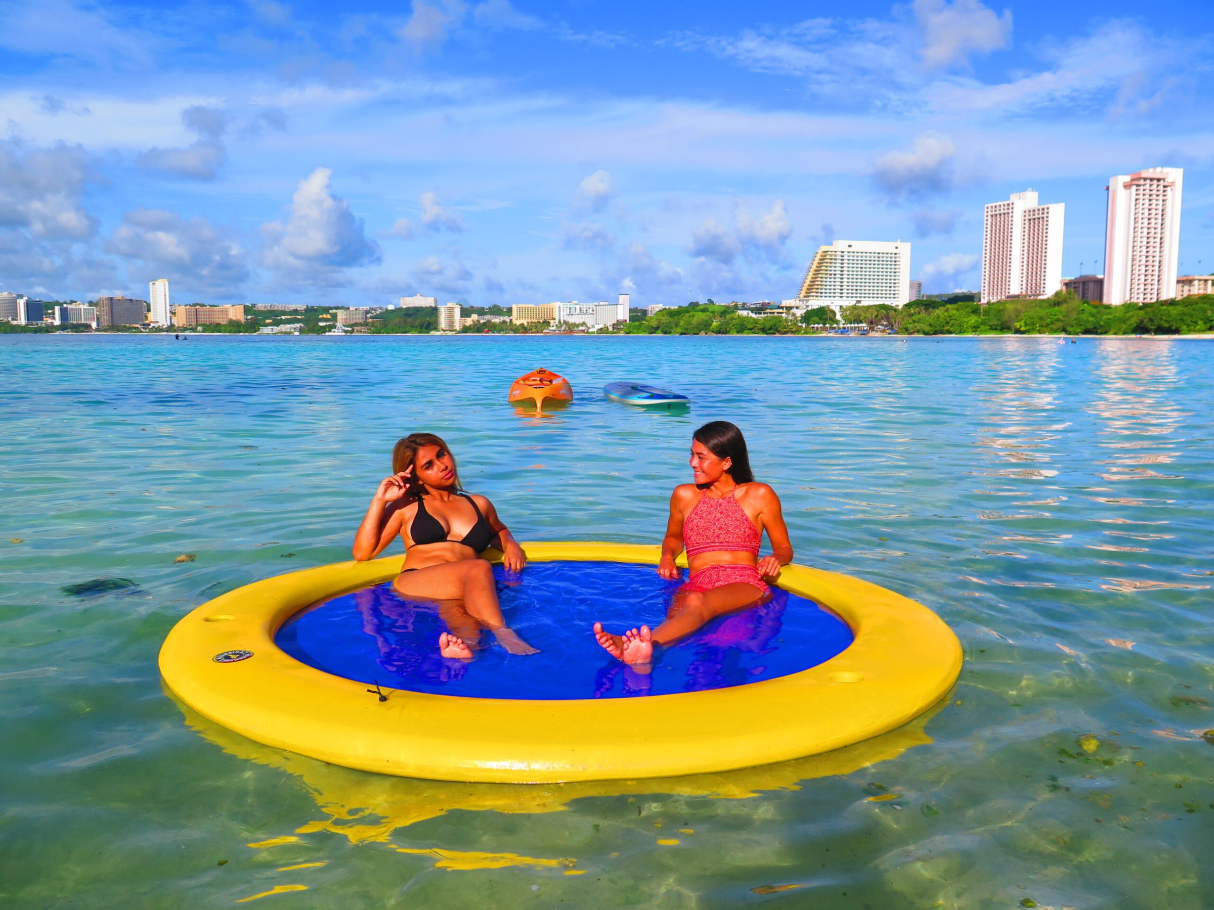 a girl in a pool of water