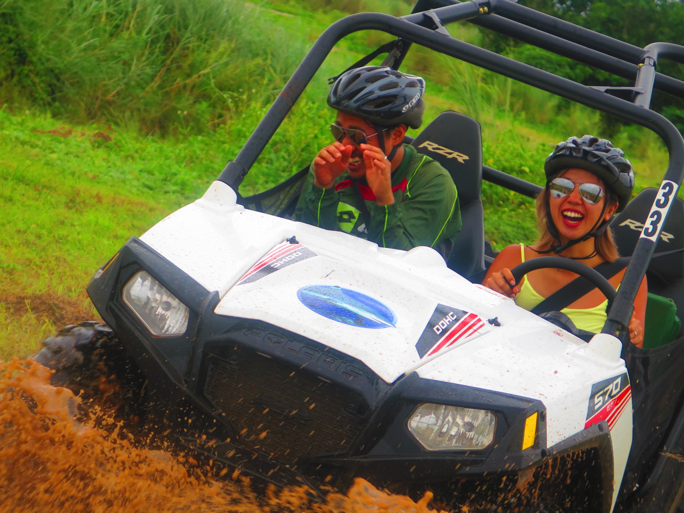 a person riding on the back of a truck